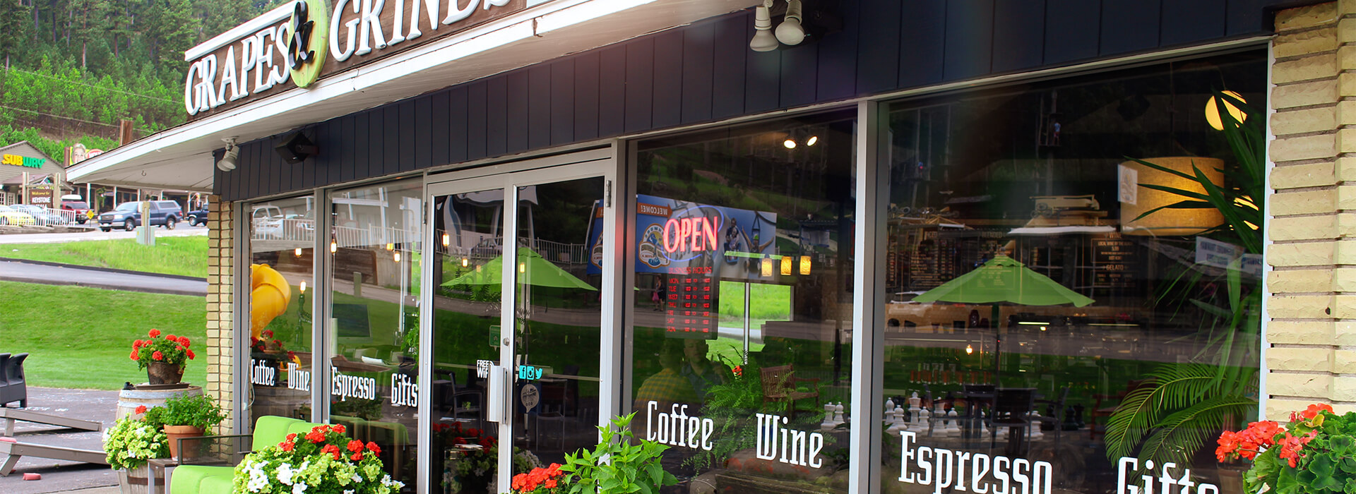Exterior photo of the Grapes and Grinds Coffee Shop and Wine Bar in Keystone, SD.